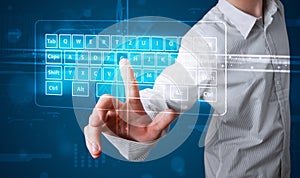 Businessman pressing virtual type of keyboard