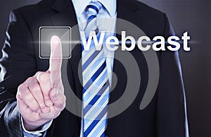 Businessman pressing webcast button