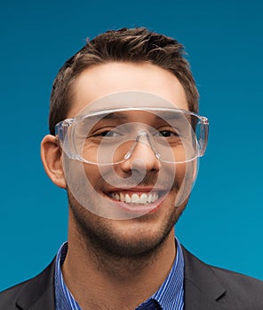 Businessman in protective glasses