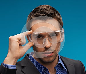 Businessman in protective glasses