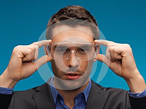 Businessman in protective glasses