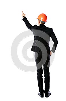 Businessman in protective helmet directing works