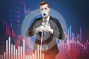 Businessman in protective mask and gloves, graphs