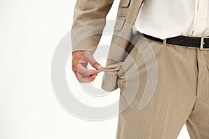 Businessman pulling out his empty pocket