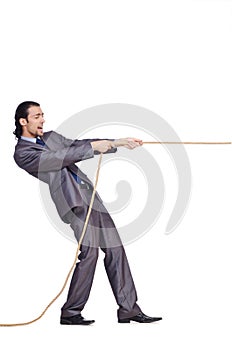 Businessman pulling rope