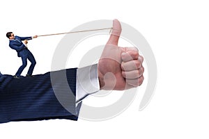 Businessman pulling rope in approve concept