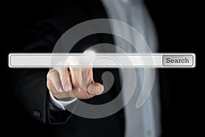 Businessman pushing a blank search bar