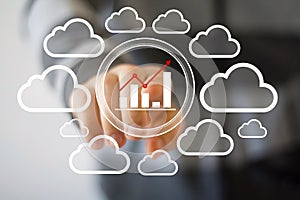 Businessman pushing button chart web diagram cloud network
