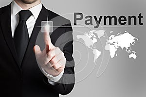 Businessman pushing button payment international service