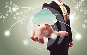 Businessman pushing cloud icon