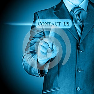 Businessman pushing CONTACT US sign