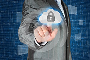 Businessman pushing virtual cloud security button