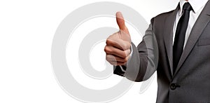 Businessman raising thumb up in approval. White background, space for text