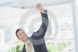 Businessman raising up his hand