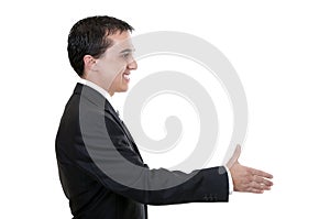 Businessman reaching out to shake hands