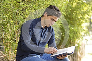 Businessman reading the bible