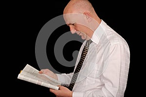 Businessman reading book