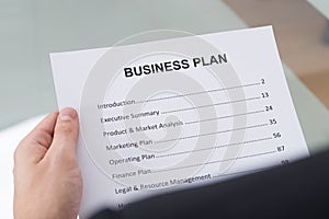 Businessman reading business plan