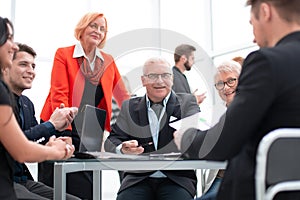 Businessman is reading contract in modern office