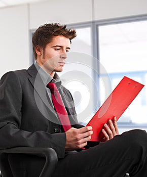 Businessman reading documents