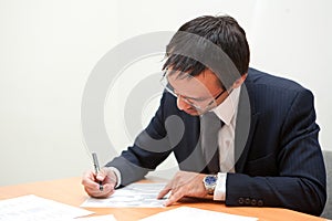 Businessman reading documents