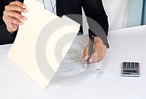 Businessman reading documents