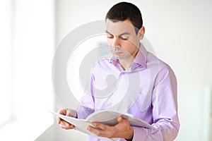 Businessman reading documents