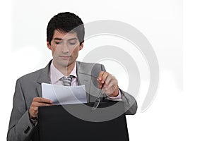 Businessman reading his notes