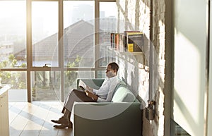 Businessman Reading Magazine Relaxation Concept