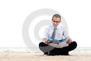 A businessman reading newspaper