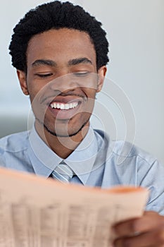 Businessman reading a newspaper