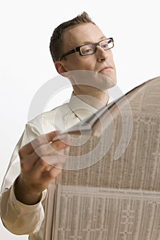 Businessman Reading Newspaper - Isolated