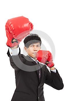 Businessman ready to fight with boxing gloves