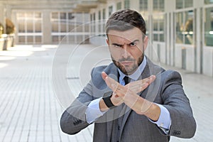 Businessman ready to fight in office space