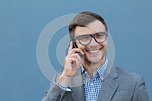 Businessman receiving encouraging news on the phone