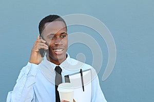 Businessman receiving encouraging news on the phone