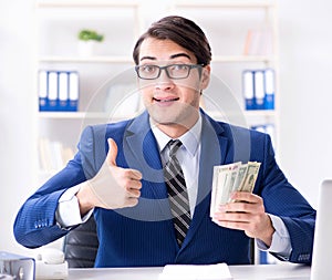 Businessman receiving his salary and bonus