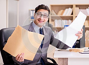 Businessman receiving letter in the office