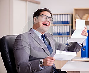 Businessman receiving letter in the office