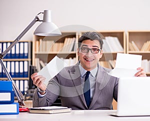 Businessman receiving letter in the office