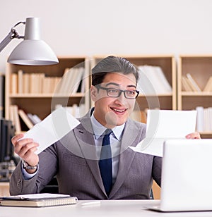 Businessman receiving letter in the office