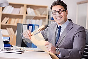 The businessman receiving letter in the office