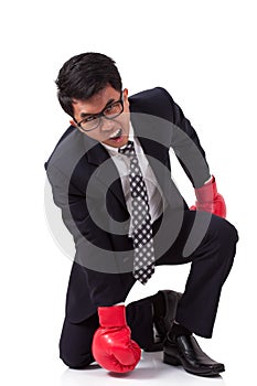 Businessman with red boxing gloves