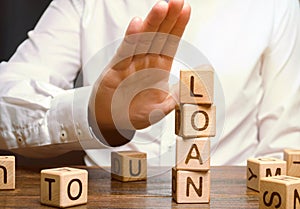 The businessman refuses expensive and risky loans. Business management and investment search. The bank refuses to issue a loan photo