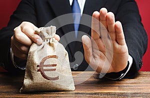 Businessman refuses to give European euro EUR money bag. Refusal to grant loan mortgage, bad credit history. Refuses cooperate.