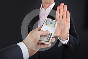 Businessman Refusing To Take A Bribe