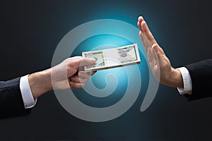 Businessman Refusing To Take Bribe From Partner