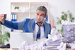 Businessman rejecting new ideas with lots of papers