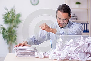 Businessman rejecting new ideas with lots of papers