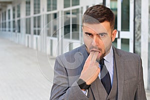 Businessman rejecting something with inappropriate hand gesture